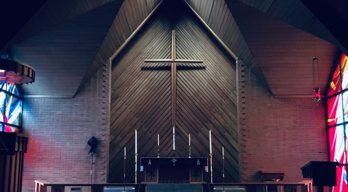 Massimiliano Camellini, un nastro e una preghiera, da spazi laici a luoghi sacri brown concrete church